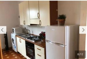 A kitchen or kitchenette at La casa di mare Salento Még 27 kép