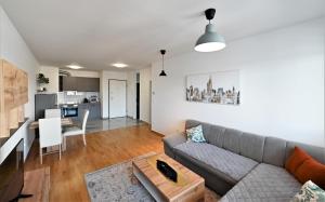 a living room with a couch and a table at Katia in Zagreb