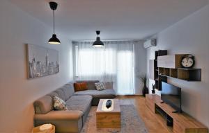 a living room with a couch and a table at Katia in Zagreb