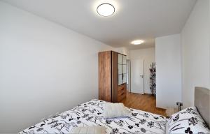 a bedroom with a bed and a closet at Katia in Zagreb +28 photos