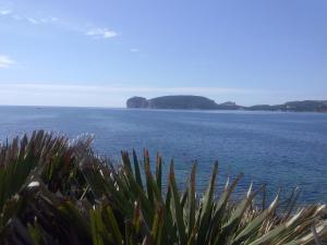 a view of a large body of water at B&B La Casa Bianca di Porto Conte in Porto Conte
