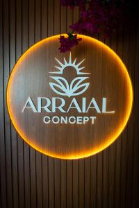 a sign on a wall that says imperial concept at Arraial Concept Hotel in Arraial do Cabo