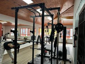a man working out in a gym at Che Cauquen in Puerto Santa Cruz