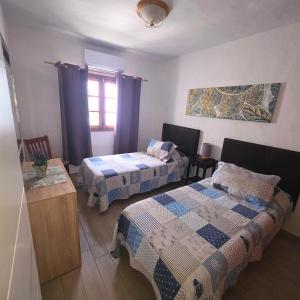Posteľ alebo postele v izbe v ubytovaní Gueldera Apartments
