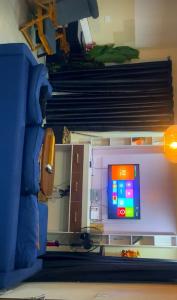 a shelf with a computer on it with a pile of paperwork at Spot1 in Ilado