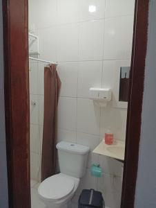 Ένα μπάνιο στο Aconchegante casa