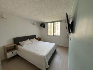 Postel nebo postele na pokoji v ubytování Hermoso Apartamento en Apulo