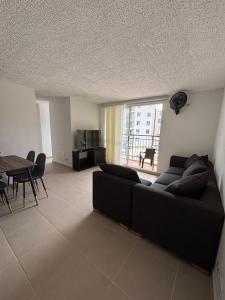 Posezení v ubytování Hermoso Apartamento en Apulo