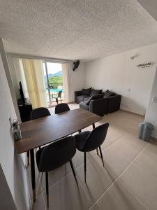 Posezení v ubytování Hermoso Apartamento en Apulo
