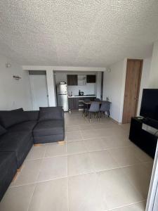 Posezení v ubytování Hermoso Apartamento en Apulo