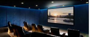 a room with chairs and a flat screen tv at Merino Gardens Deluxe 3 Bed by Tower Bridge in London