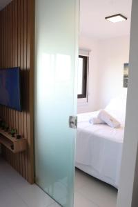 Postel nebo postele na pokoji v ubytování Lindo apartamento em Ondina - Salvador