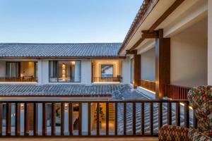 Rõdu või terrass majutusasutuses 大理沙溪云喜七月精品客栈 Shaxi Ancient Town Yunxi Qiyue Guesthouse