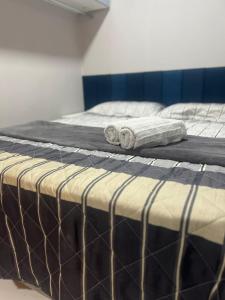 En eller flere senge i et værelse på Estação inverno 2