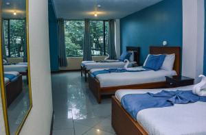 Postel nebo postele na pokoji v ubytování Hotel Miraflores + 37 fotografií