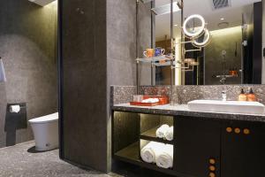 Arthur Hotel Baiyun Guangzhou的一间浴室
