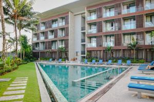 Bazén v ubytování Wyndham Tamansari Jivva Resort Bali nebo v jeho okolí
