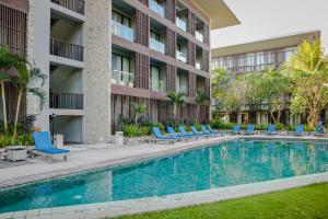 Bazén v ubytování Wyndham Tamansari Jivva Resort Bali nebo v jeho okolí