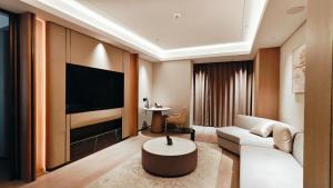 Sjónvarps- og/eða afþreyingartæki á Xi'an Jinling Purple Mountain Hotel