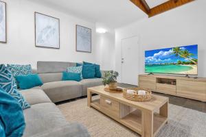 Fotografie z fotogalerie ubytování Belle Escapes Under the Mango Tree Holiday Home v destinaci Trinity Beach