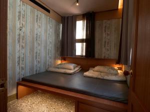 Uma cama ou camas num quarto em 成說時光文旅