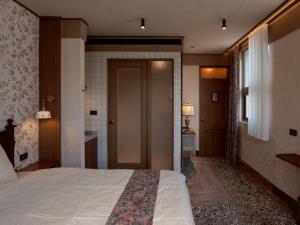 Uma cama ou camas num quarto em 成說時光文旅
