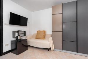 TV a/nebo společenská místnost v ubytování Kata Station Boutique Hotel