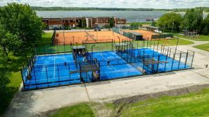 an overhead view of a pool with a basketball court at Sofi Apartment in Võru