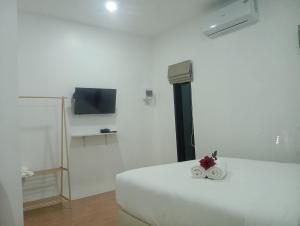 FIELD GOOD Resort at Chiang Rai客房内的一张或多张床位