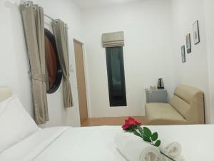FIELD GOOD Resort at Chiang Rai客房内的一张或多张床位