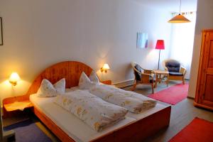 Postel nebo postele na pokoji v ubytování Hotel Löwen