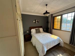 Postel nebo postele na pokoji v ubytování Jos Home appartement Cozy à bastos