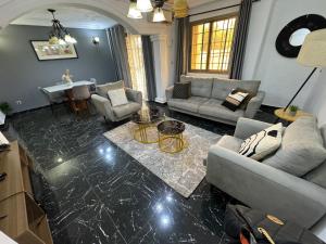 Posezení v ubytování Jos Home appartement Cozy à bastos