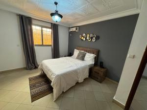 Postel nebo postele na pokoji v ubytování Jos Home appartement Cozy à bastos