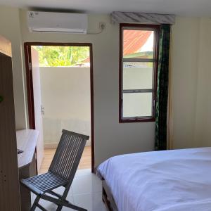 Ένα ή περισσότερα κρεβάτια σε δωμάτιο στο Labuan Bajo room