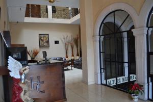 TV i/ili multimedijalni sistem u objektu Hotel Conquistadores