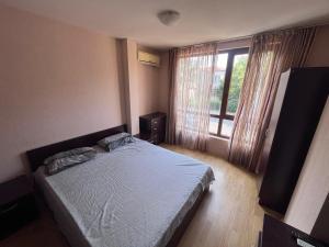 A bed or beds in a room at Julia Vigo Panorama apartments