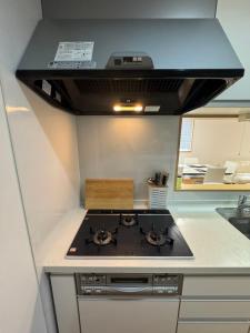مطبخ أو مطبخ صغير في 5 Minutes Train to Haneda Airport 2 Bedrooms 5 Beds Fully Equipped 2 Story Private House