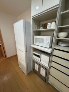 مطبخ أو مطبخ صغير في 5 Minutes Train to Haneda Airport 2 Bedrooms 5 Beds Fully Equipped 2 Story Private House