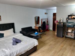 Postel nebo postele na pokoji v ubytování แม่ตังค์ ห้องพักc5