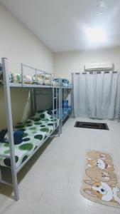 Postel nebo postele na pokoji v ubytování Gulf Gateway Hostel