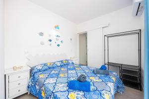 Łóżko lub łóżka w pokoju w obiekcie Gran Sol Family 6