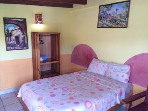 Postel nebo postele na pokoji v ubytování Hotel Las Salinas