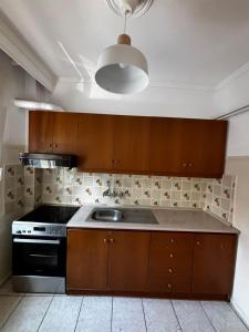 Kuchyň nebo kuchyňský kout v ubytování Ioanna apartment