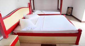 Postel nebo postele na pokoji v ubytování Hotel Uva Rest Sanasta