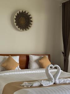 Postel nebo postele na pokoji v ubytování Villa Ayu Lombok