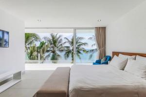 Postel nebo postele na pokoji v ubytování Ocean Villa - Lying By The Sea - Free Breakfast + 38 fotografií