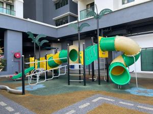a playground in front of a building at Le Cozy Home UKM BANGI KAJANG BACC GMI UIS in Bangi