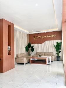 Posezení v ubytování Garuda Hotel By Calandra