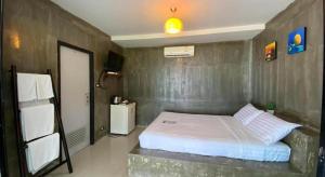 Ένα ή περισσότερα κρεβάτια σε δωμάτιο στο Rim Kaeng resort +61 φωτογραφίες